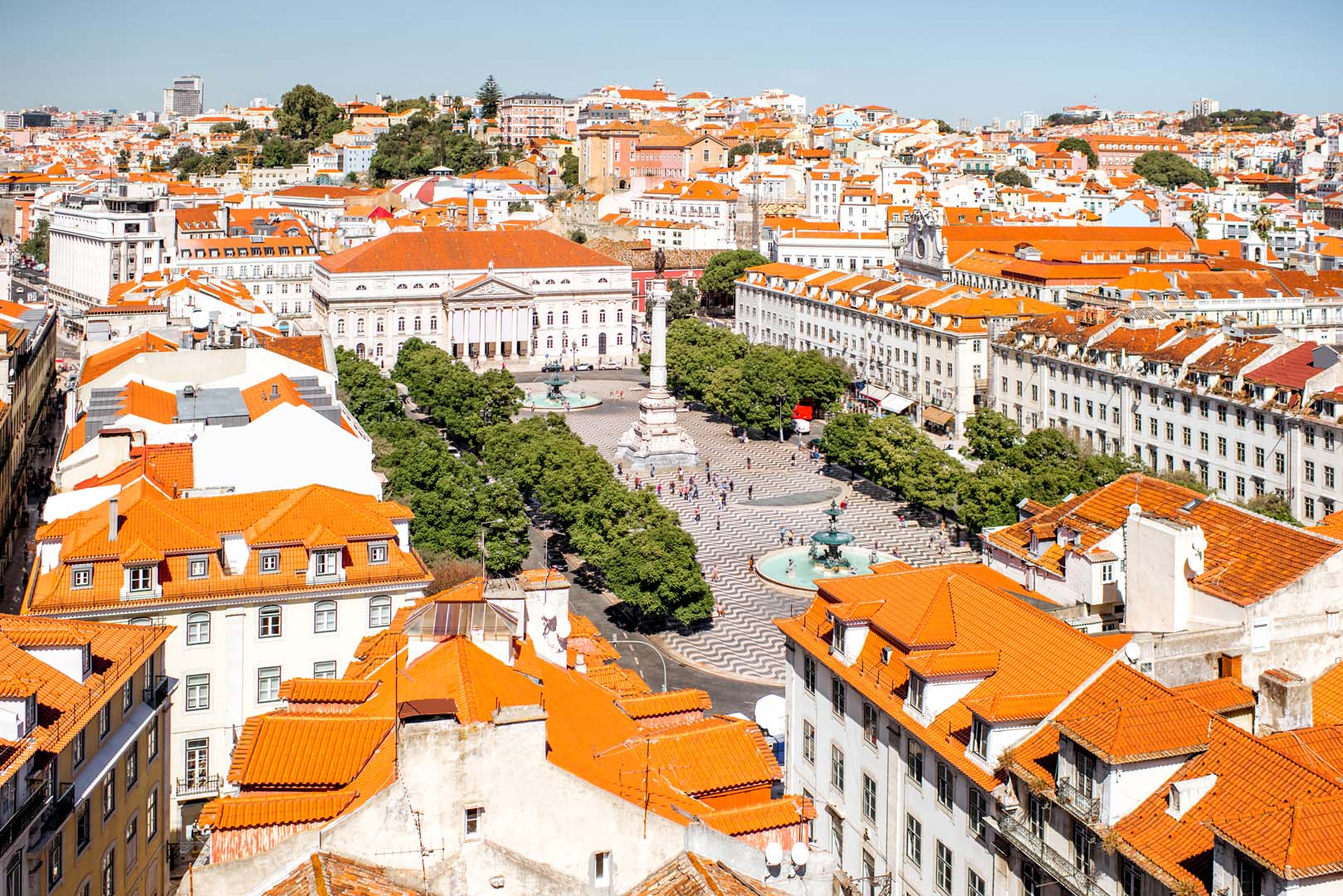 Cityscape view on the old town with Rossio square during the sunny day in Lisbon city, Portugal
