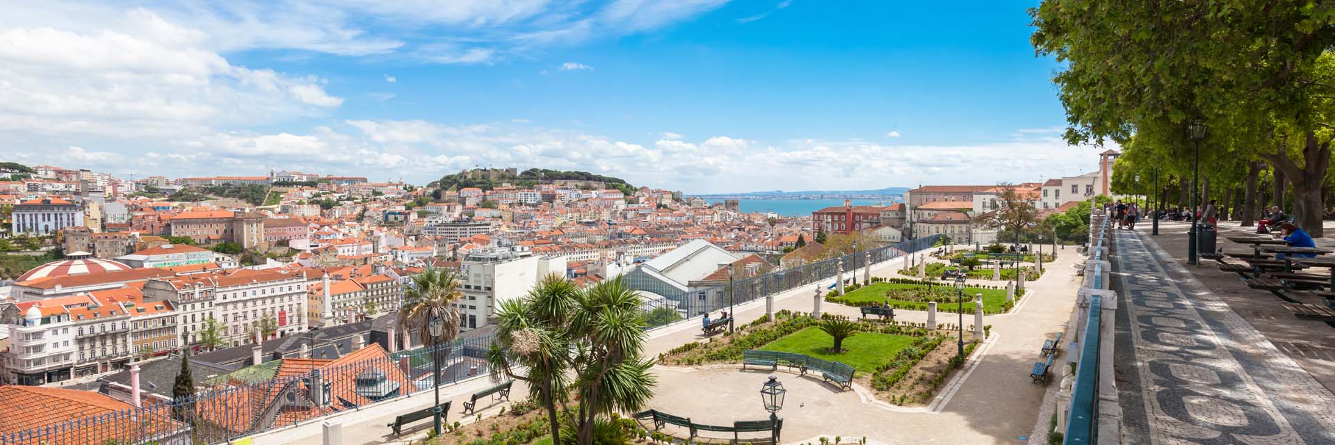 Panoramic view of Lisbon rooftop from Sao Pedro de Alcantara viewpoint - Miradouro in Portugal